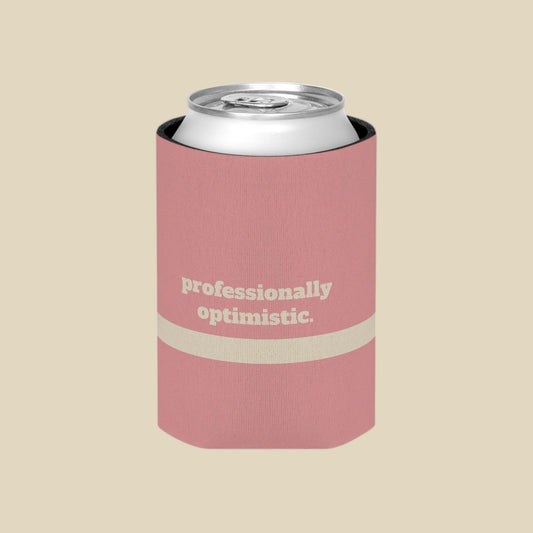 A pink neoprene can cooler sleeve with a silver aluminum can inside, featuring the text 'professionally optimistic.' in white on the front, set against a plain white background.