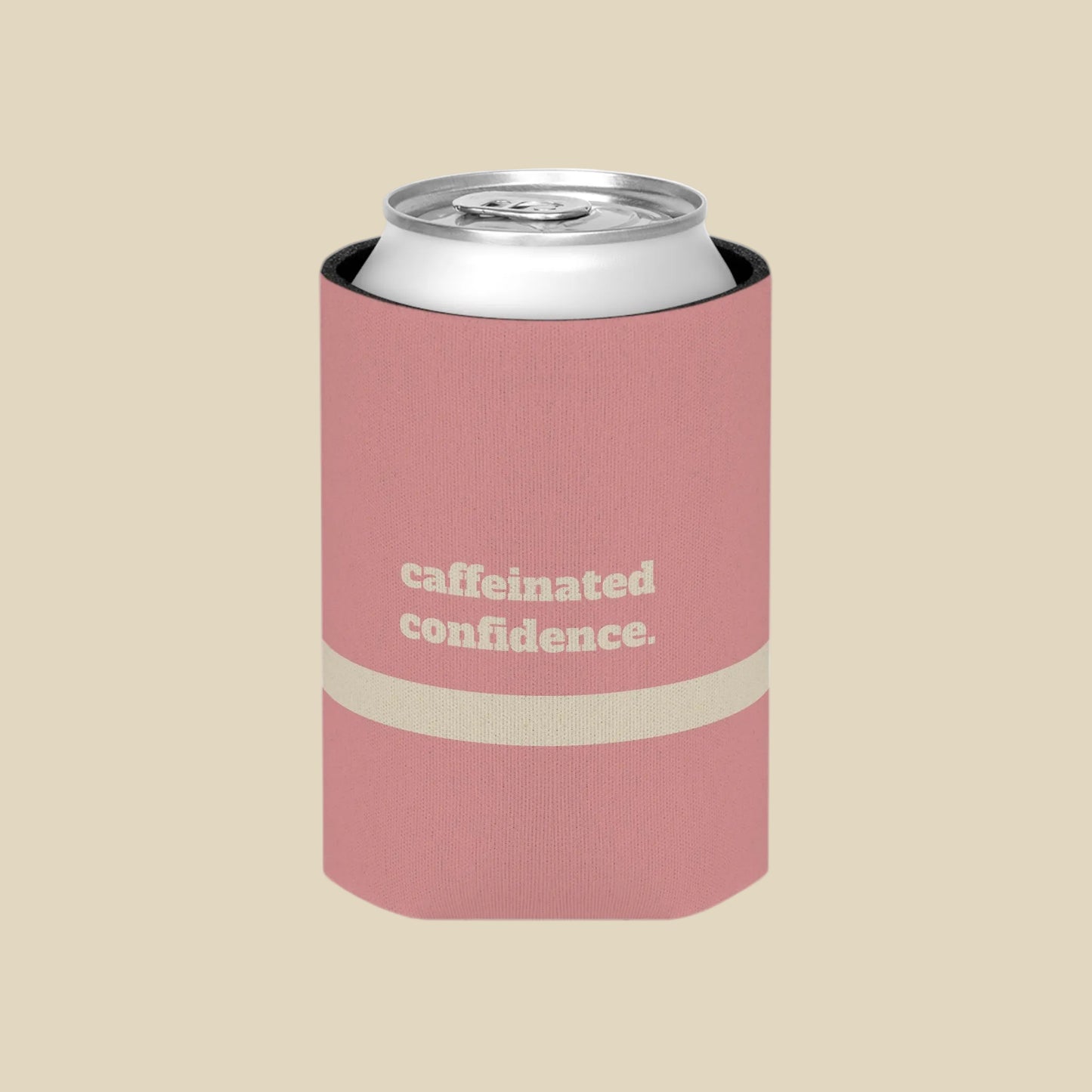 A pink can cooler sleeve holding a silver aluminum can, featuring the text 'caffeinated confidence.' in white on the front, set against a plain white background.
